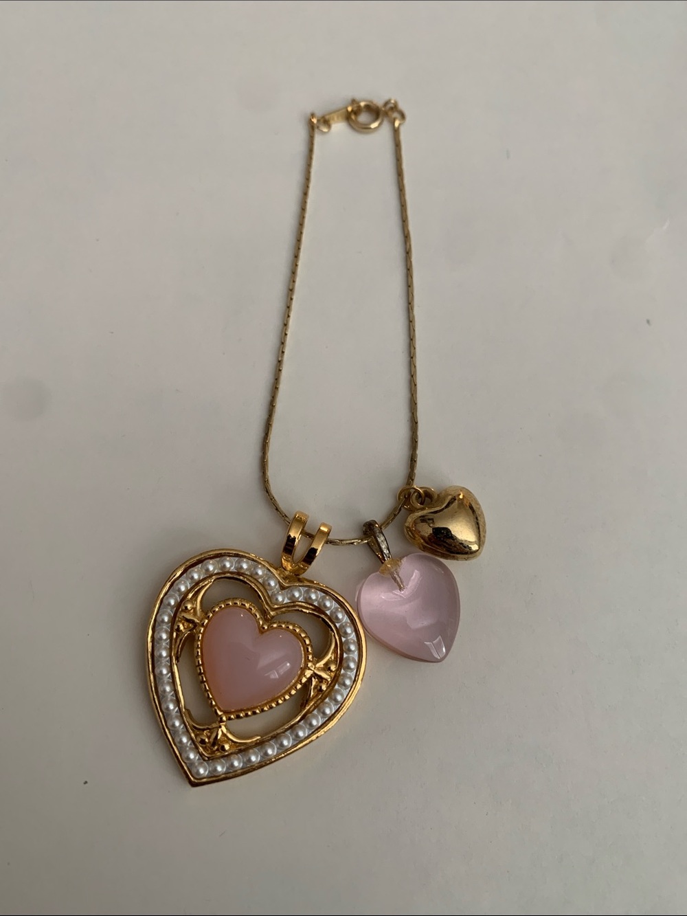 Avon Gold-Tone Necklace with Pink Heart Charms and Pearl Accents
